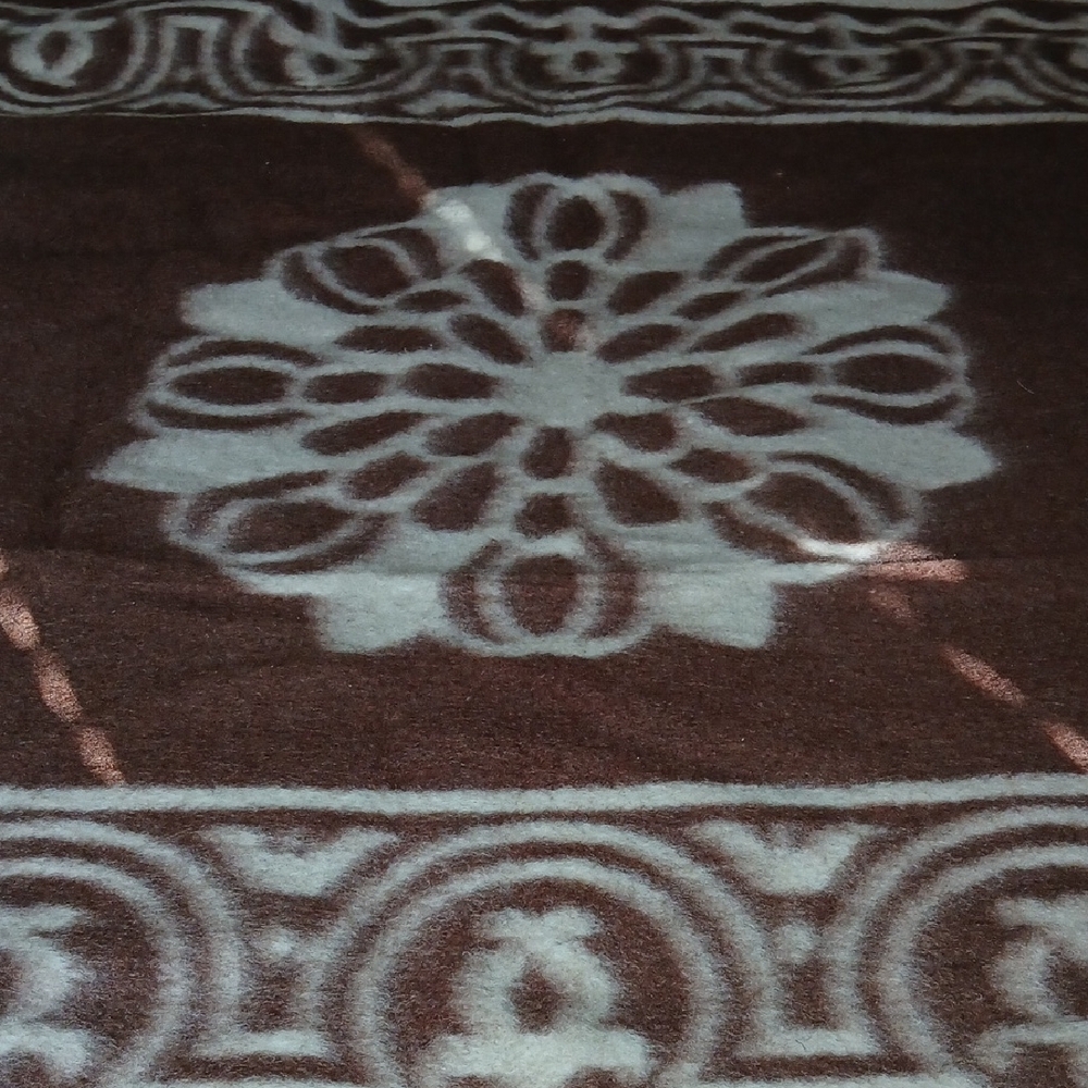 Elegant Brown and Cream Patterned Blanket